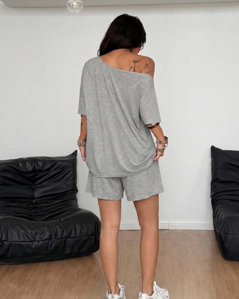 Dam Tvådelat set med one shoulder-topp och lösa shorts